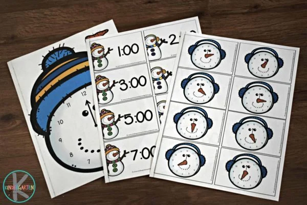 Snowman time telling printables are shown. (time telling)