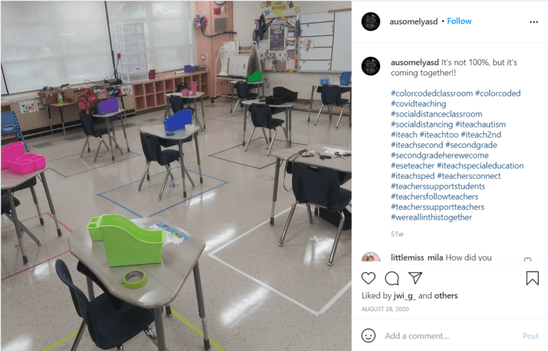 Socially-distanced seating arrangements created with tape on the floor in classroom