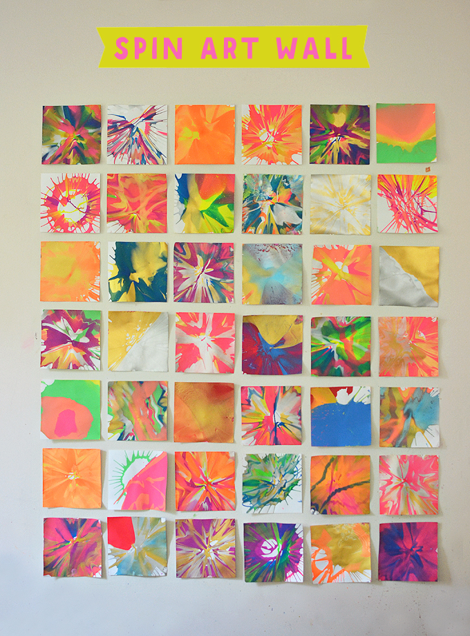 A colorful wall decoration made from squares of spin art 