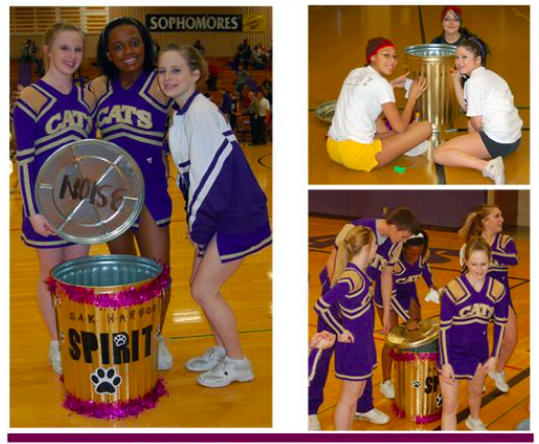 School cheerleaders amping up the crowd with a spirit can as an example of school spirit ideas