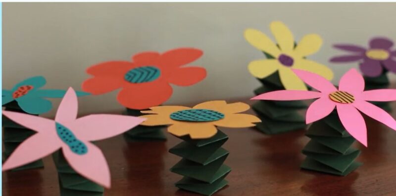 Springy spring flowers craft made of folded paper.