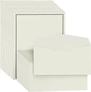 white stationary and envelopes 