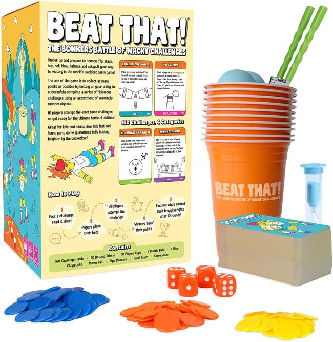 Family game called Beat That! with cups, dice, chips, and more