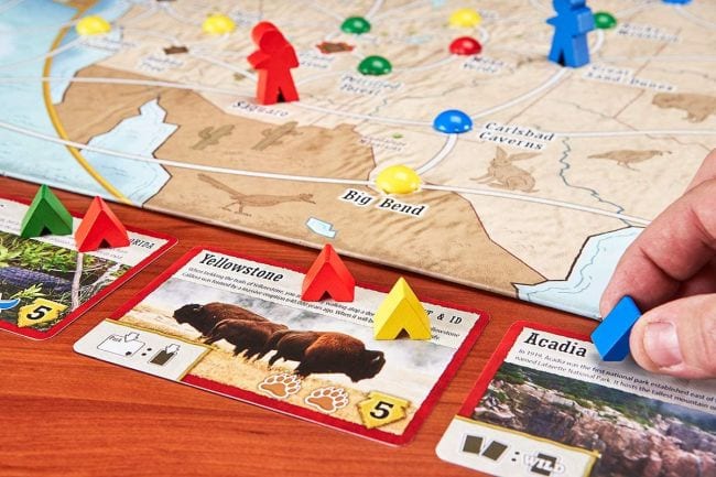 Board, cards, and markers for the game Trekking the National Parks