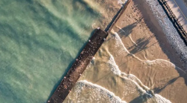 A photo of a shoreline along the Great Lakes