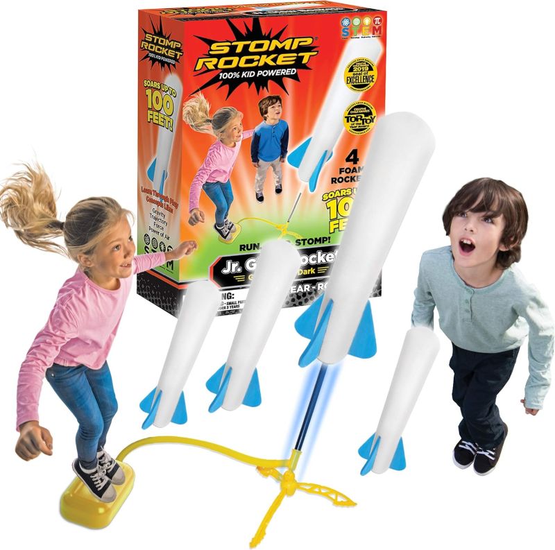 Kids playing with pressure-activated foam Stomp Rockets