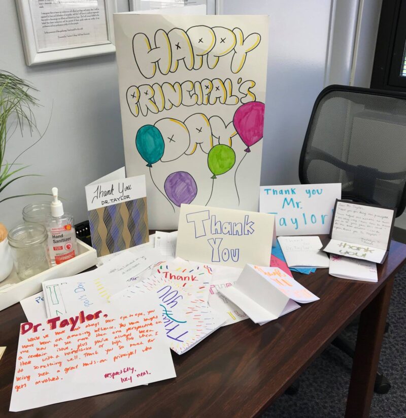 happy principal's appreciation day cards on a desk 