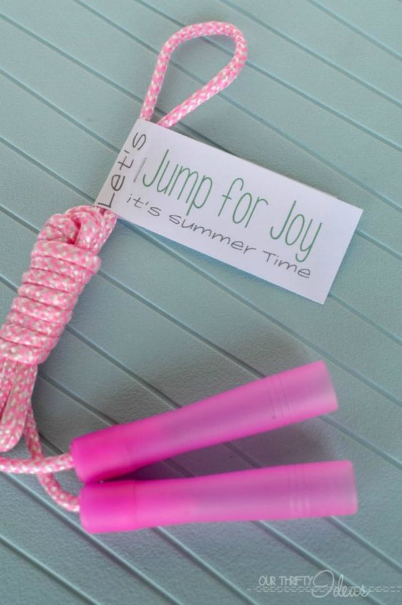 A pink jumprope with a gift tag attached