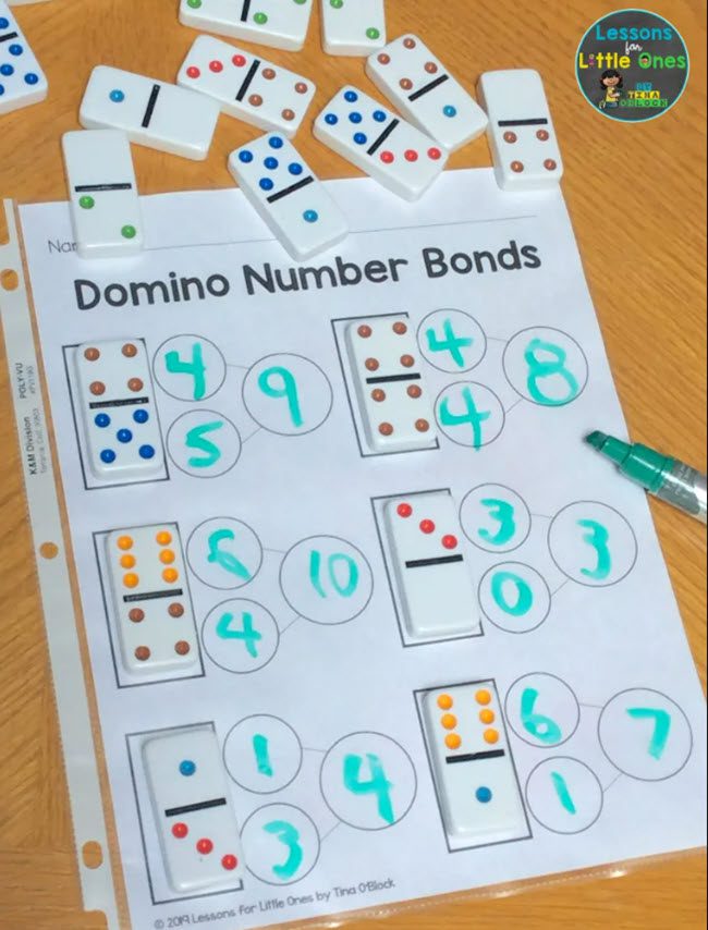Domino Number Bonds worksheet with pile of dominoes