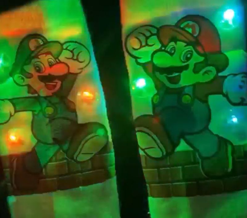 Super Mario Brothers socks with battery powered lights added