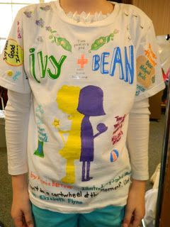 A child wears a t-shirt decorated as a book report as an example of creative book report ideas