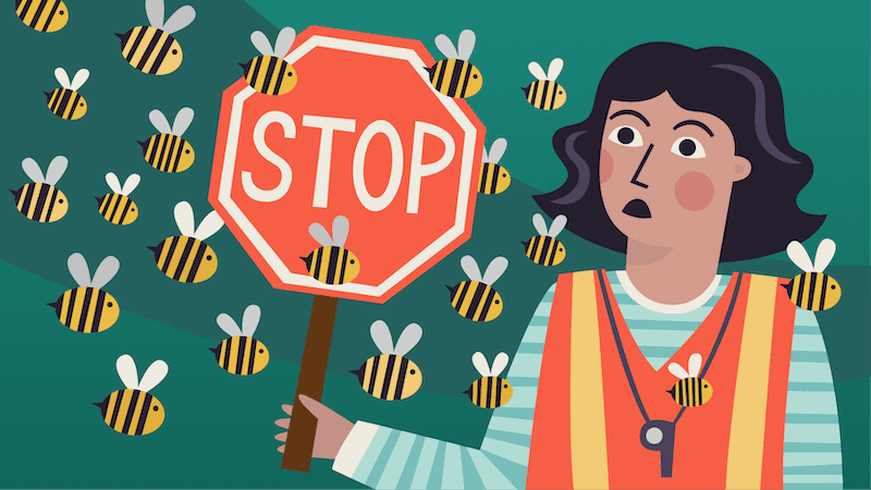Crossing guard with stop sign surrounded by bees