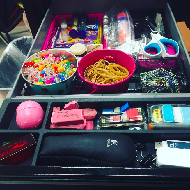 Teacher organization of a desk drawer