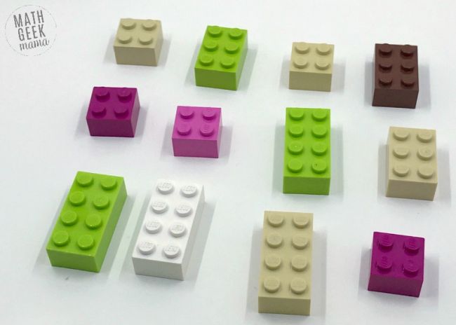 Multi-colored LEGO bricks laid out on a table