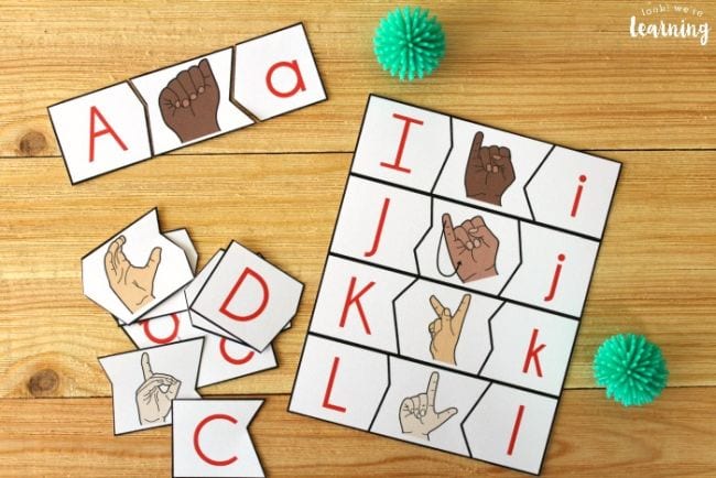 Puzzle strips with capital and lower case letters and the ASL sign for each