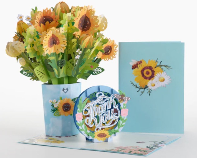 A bouquet of popup paper sunflowers, with a popup thank you card and matching envelopes