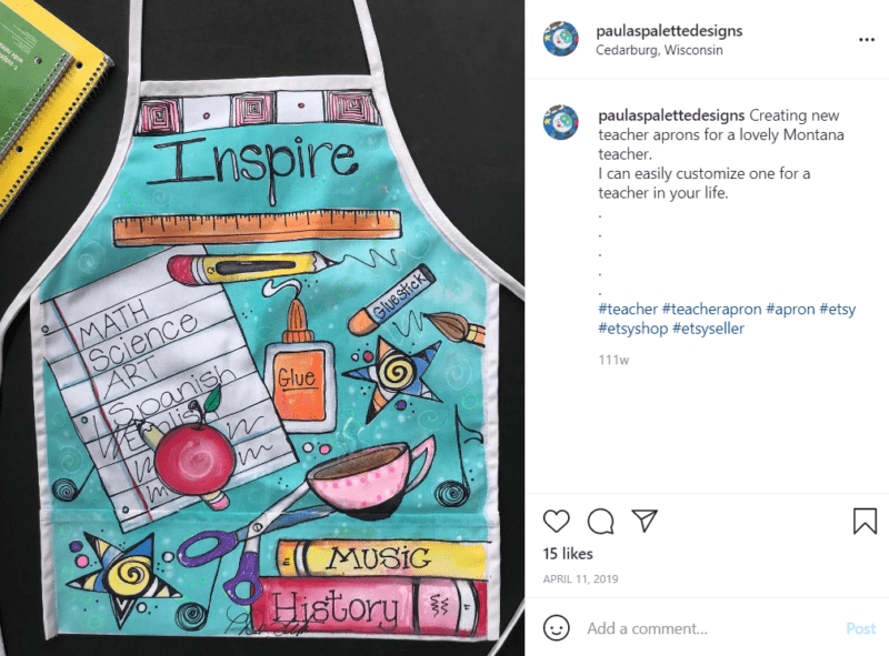 Laid out teacher apron with the word Inspire across the top of the apron and miscellaneous educator images on it