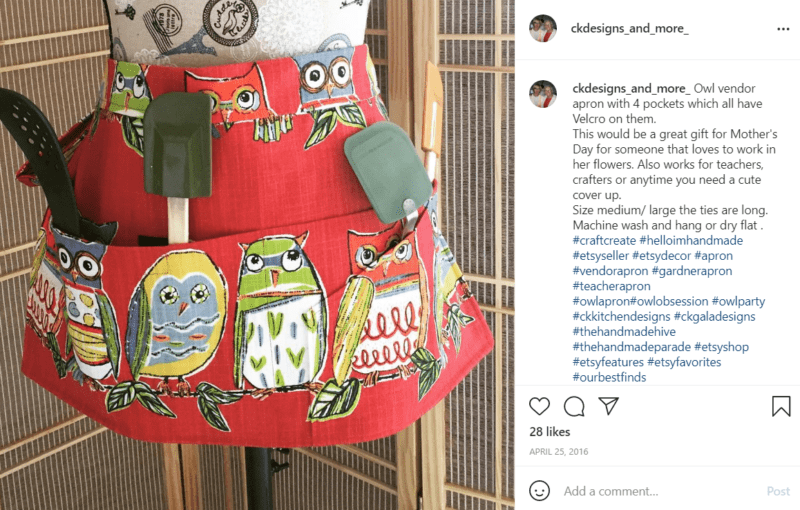 Teacher apron with cartoonish owls and pockets with spatulas on a mannequin