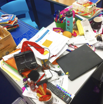 Cluttered teacher desk