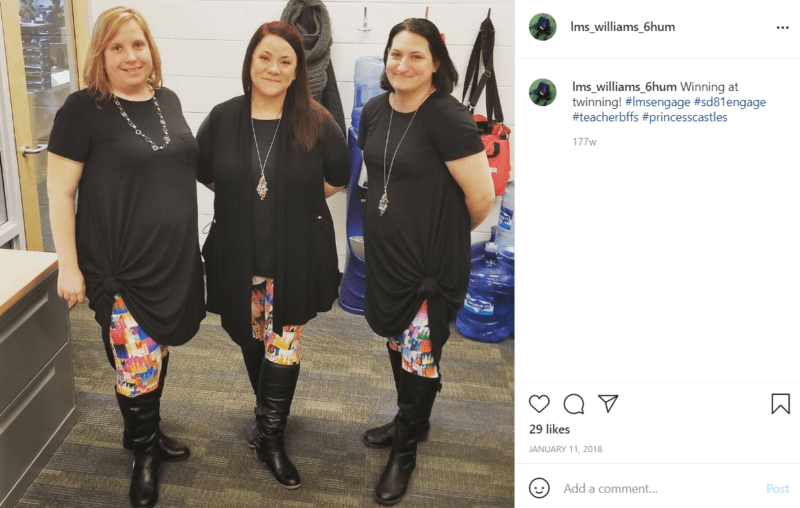 Three teachers wearing the same outfit consisting of black knee high boots