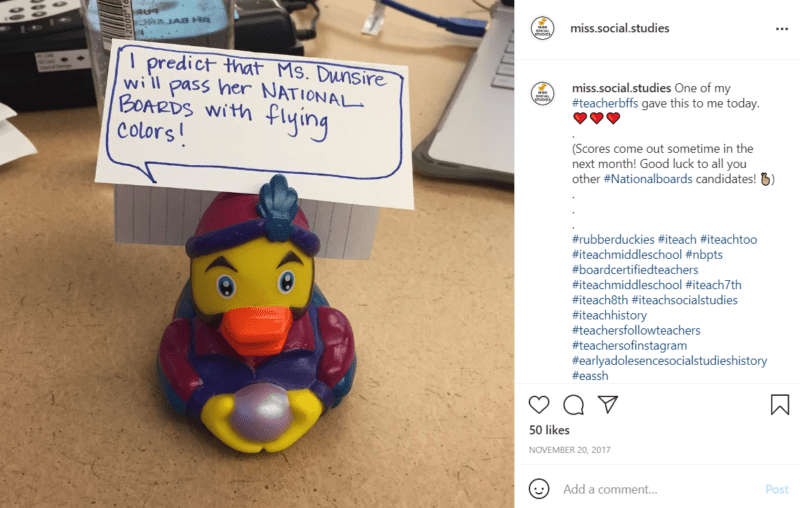 Rubber duck dressed as a fortune teller on a desk in classroom