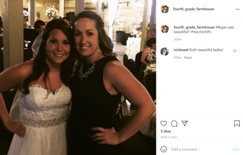 Two teachers pose at a wedding reception and one is the bride