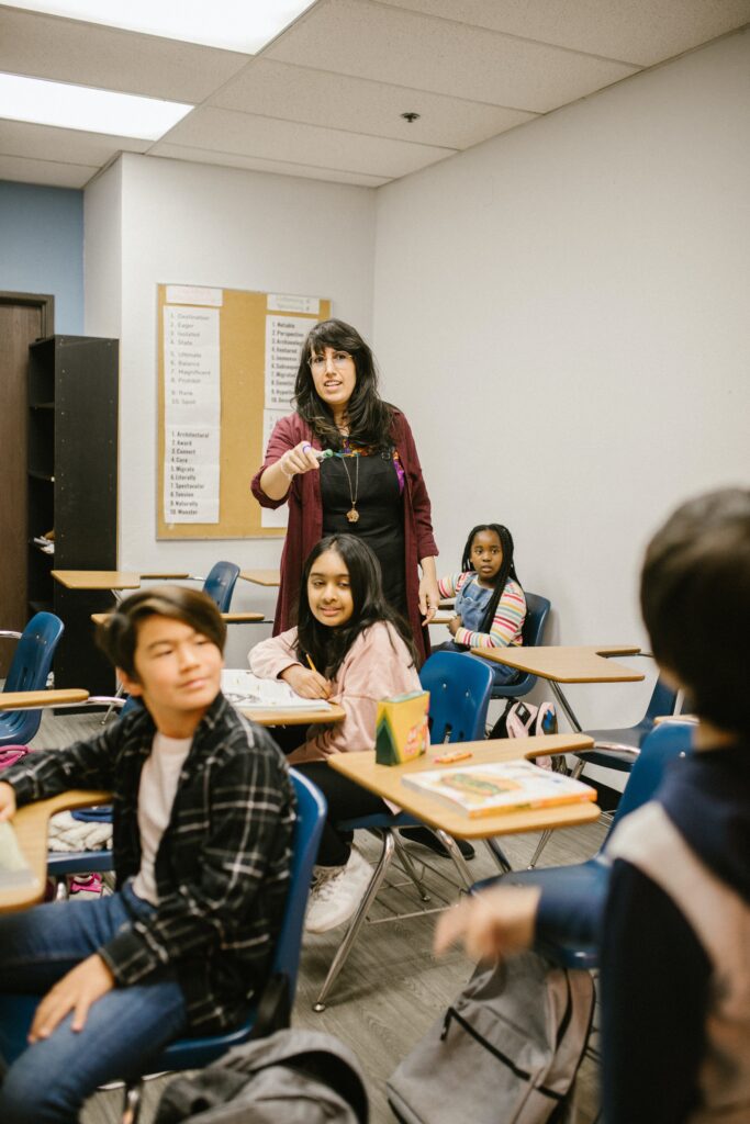 teacher in front of classroom 