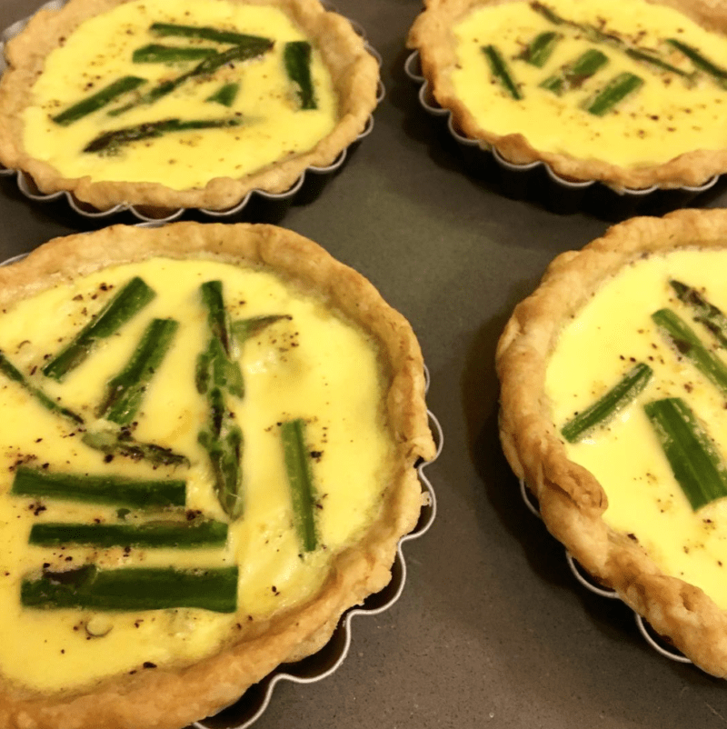 Four individual quiches, prepared ahead of time for teacher lunches