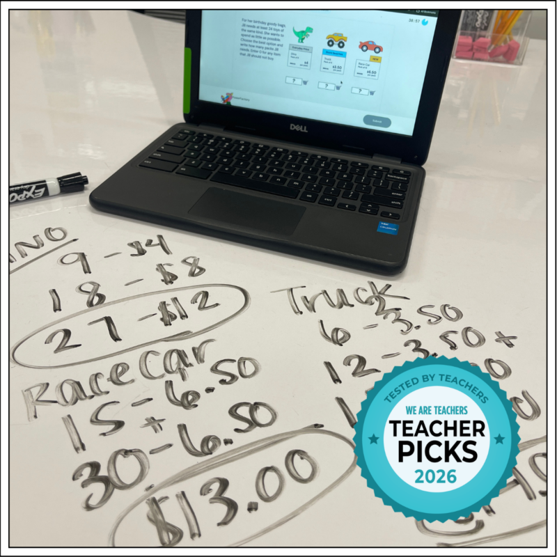 Laptop showing Math Jams problem on desk where students write out computations using dry erase marker.