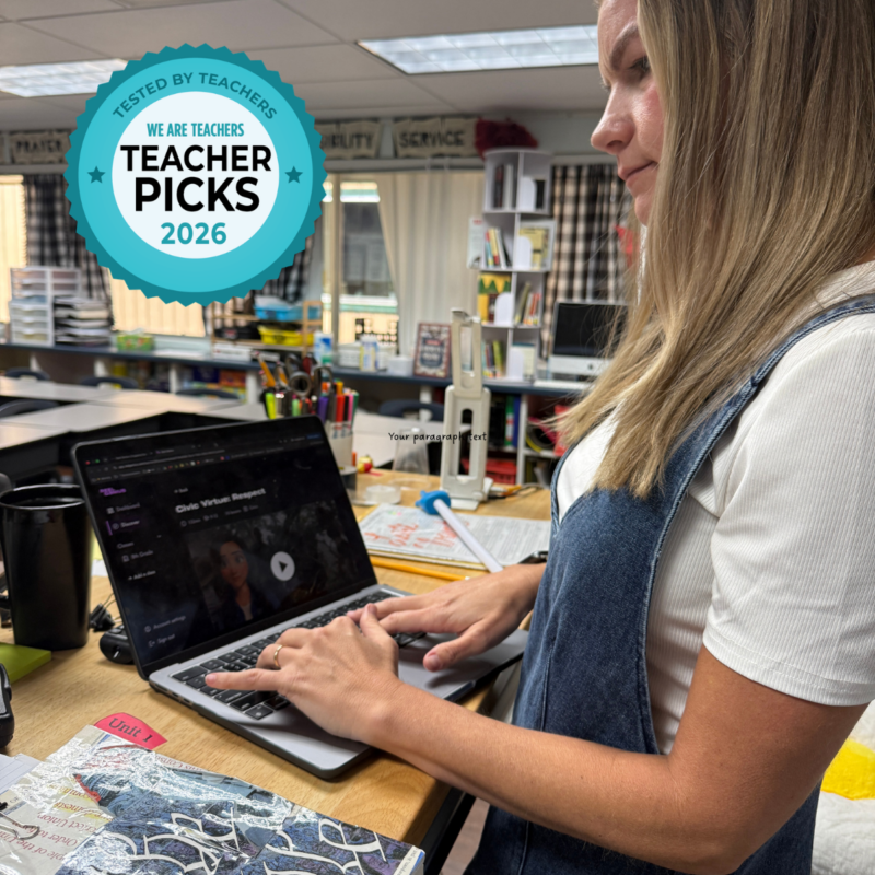 Teacher Picks Reel Genius Laptop Teacher viewing Reel Genius lessons on a laptop in a classroom.