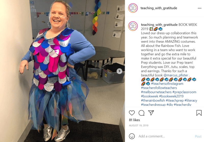 Teacher dressed as a rainbow fish with silver shoes in classroom