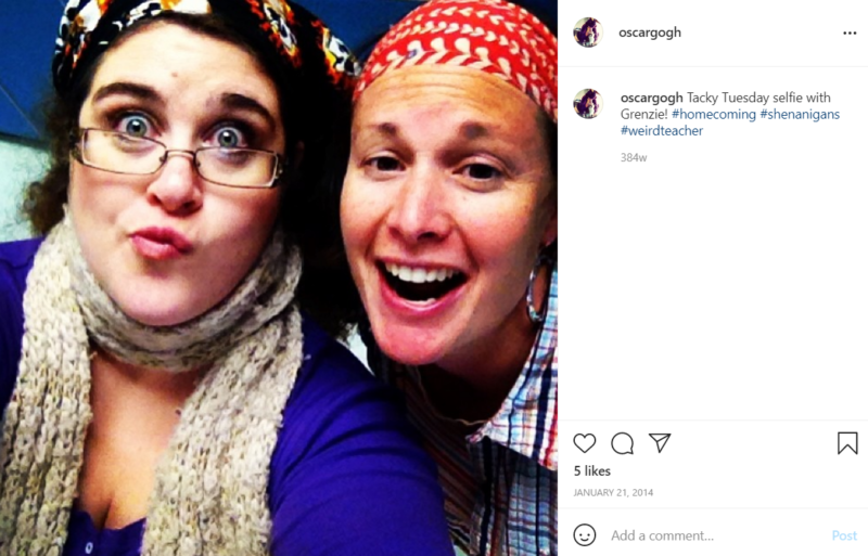 Closeup of two teachers making funny faces while being dressed for tacky tuesday