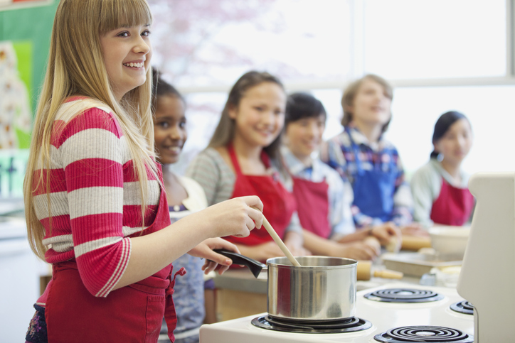 Students in cooking class, as an example of life skills for teens