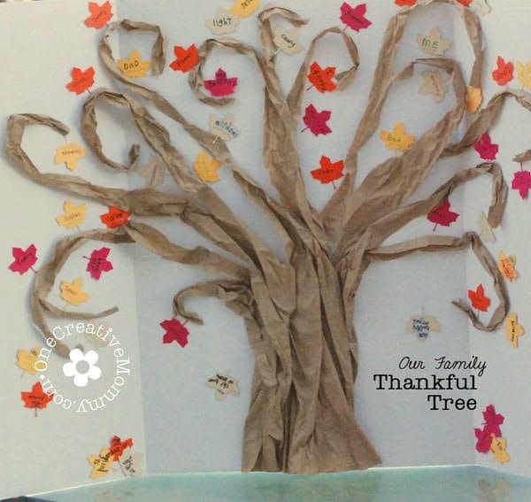 Fall bulletin boards include trees like this one with 3-D bark and many different colored fall leaves attached.
