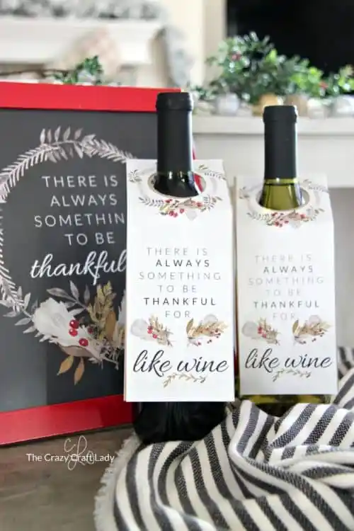 Two bottles of wine with a thank you note attached  as example of Thanksgiving gifts for teachers
