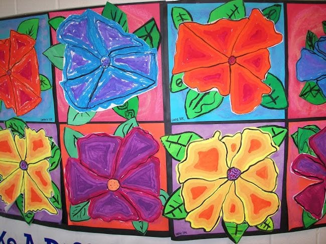 Large red, blue, yellow, and purple flowers in the style of Georgia O'Keeffe (Third Grade Art)