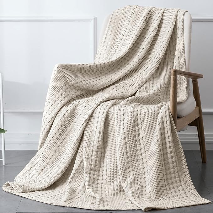 white blanket thrown over chair for a gift idea for a book lover
