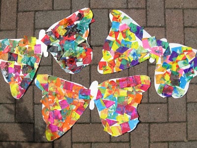 Colorful butterflies made from construction paper and cut squares of tissue paper