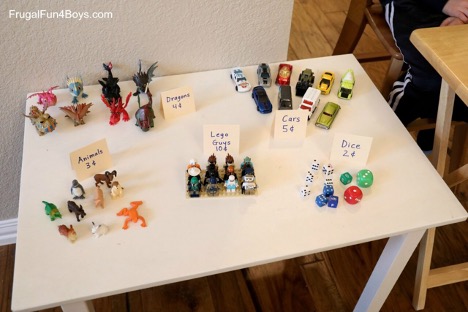 toys set up on a table for a math fact game 