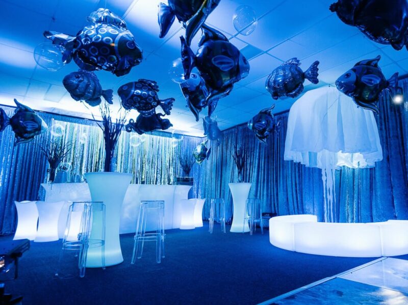 Prom venue with jellyfish hanging from the ceiling