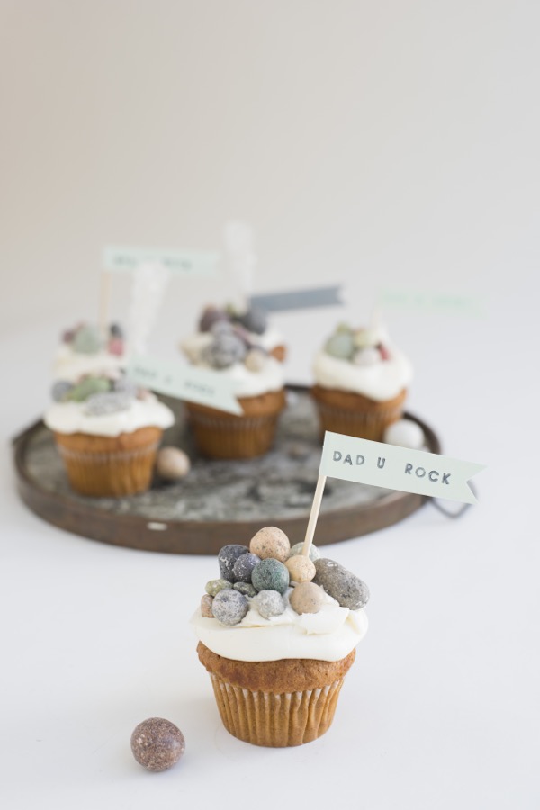 The best Father's Day crafts for kids can include edible things like these cupcakes that have edible rocks on them and say Dad U Rock.