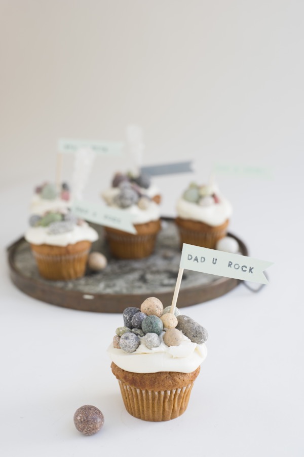 Father's Day crafts for kids can include edible things like these cupcakes that have edible rocks on them and say Dad U Rock.