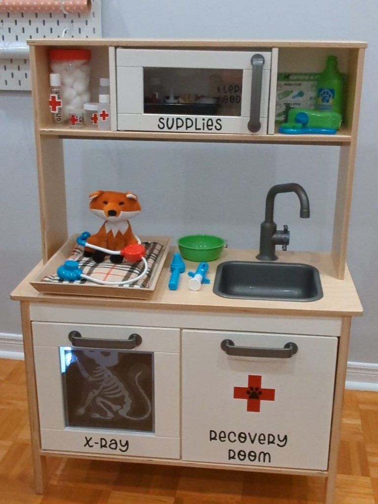 A toy kitchen is transformed into a vet clinic (ikea classroom)
