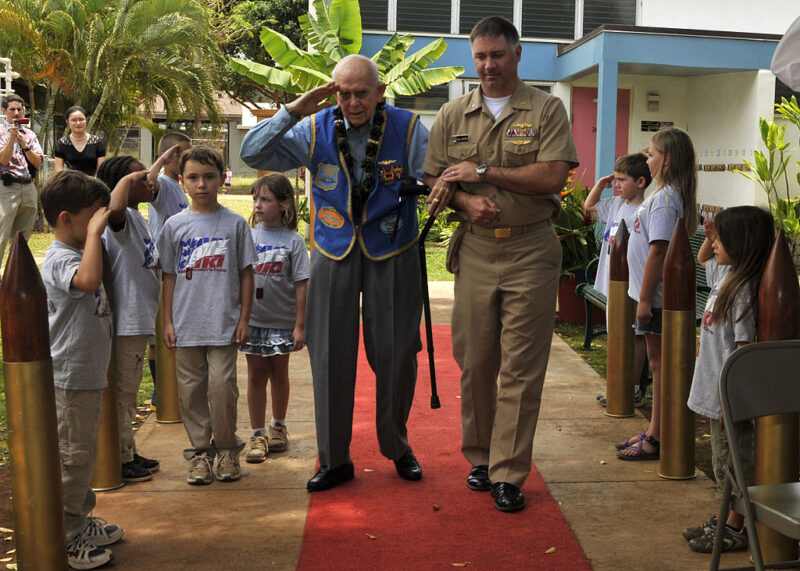 Hawaii resident and World War II veteran retired Rear Adm. Lloyd "Joe" Vasey arrives at the Navy Hale Keiki School where he was presented the first annual "Heart of a Hero" award by the Young Patriot's Club during a ceremony. 