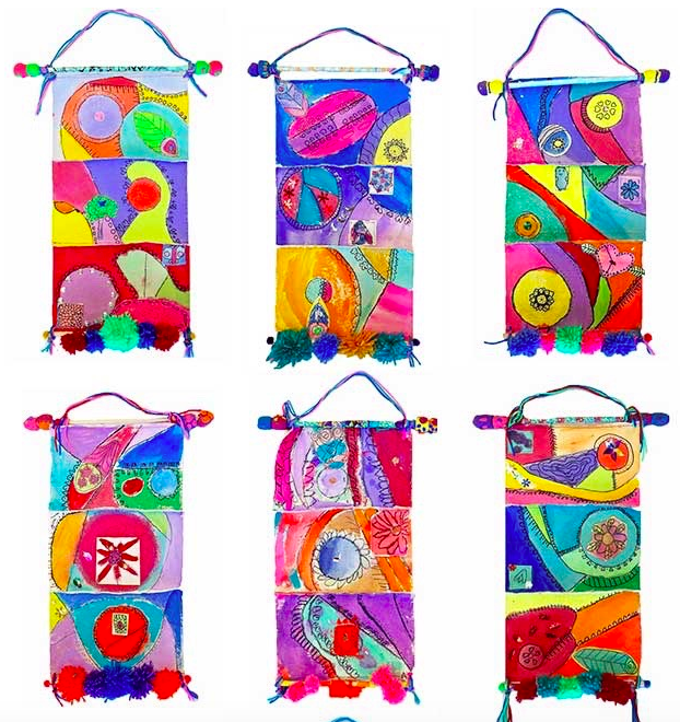 Colorful kid-created wall hangings as an example of school auction art projects