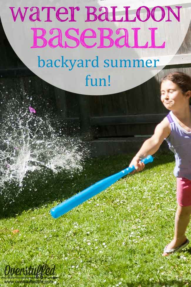 kid playing with a pool noodle and water balloon for water activity water balloon baseball 