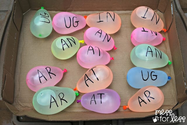 water balloons with letters written on them for a water activity 