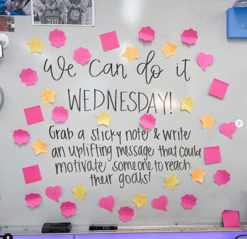 Sticky note strategy on a white board with text 'We Can Do It Wednesday'