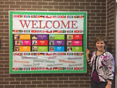 all are welcome front office bulletin board different languages saying welcome