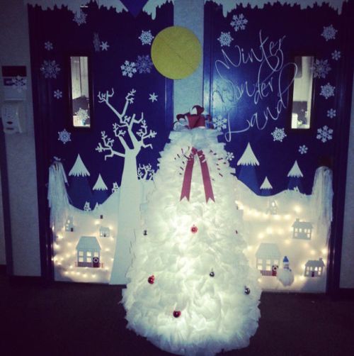 Two classroom doors decorated with blue and white to look like a lighted winter landscape (Winter Classroom Doors)